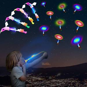 lot 9341 image: WELLVO 30 Pack Rocket Helicopter with LED Lights 30 Launchers  30 Glow Rocket Helicopters Glow in The Dark Party Supplies Flying Outdoor Toys Party Favors for Kids 8-12,4-8