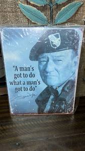 lot 7 image: John Wayne Quote Metal Sign A Mans Got To Do