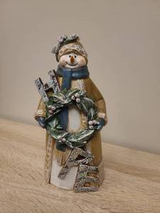 lot 39 image: Christmas Snowman Figurine with Wreath and Winter Coat