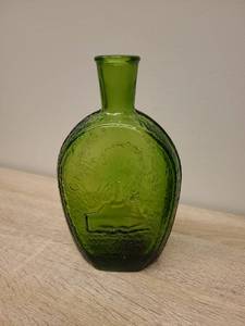 lot 72 image: Green Glass Decorative Bottle with Eagle Design