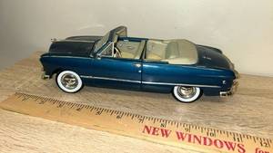 lot 87 image: 1949 Ford Convertible Die-Cast Model Car