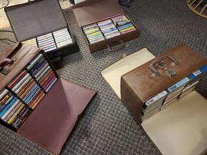 lot 135 image: Large Lot of Cassette Tapes in Carrying Cases