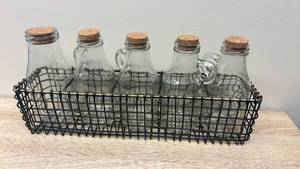 lot 9 image: Glass Milk Bottles with Cork Tops and Wire Basket Caddy �� Set of 5