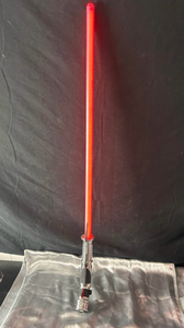 lot 62 image: Count Dooku Inspired Red Lightsaber with Chrome Hilt, this thing is awesome For the real collectors