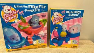 lot 66 image: 2010. Zhu Zhu Babies Rock-A-Bye Firefly Power Pod & Bluebird Buggy Set