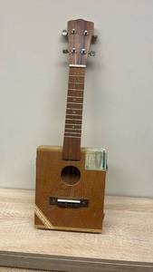 lot 71 image: Ukulele with Wooden Neck