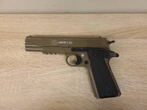 lot 89 image: Colt M1911 A1 BB Air Pistol in TanFDE
