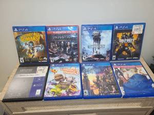 lot 98 image: PS4 Video Games Lot of 8 - Destroy All Humans, Injustice, Star Wars Battlefront, Call of Duty Black Ops 4, Horizon Zero Dawn, LittleBigPlanet 3, Kingdom Hearts 3, Naruto Storm 4