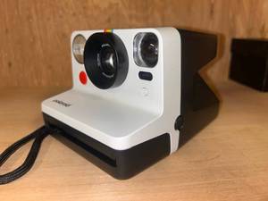 lot 100 image: Polaroid Now Instant Camera I Type instant camera, retail $136.99