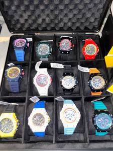 lot 131 image: Invicta Chronograph RACING Watch  Collection Set of 12 with Case and Boxes all brand new never worn