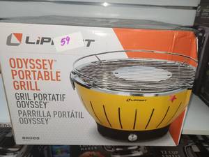 lot 59 image: Lippert Odyssey Portable Charcoal Grill