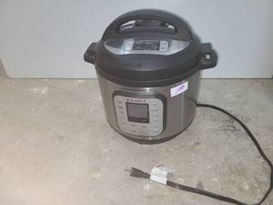 lot 100 image: Instant Pot Multi-Use Pressure Cooker