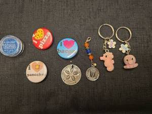 lot 50856 image: Fun Novelty Button Pins, Keychains, Charm and Nail Glitter Lot