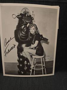 lot 50939 image: Anne Francis Signed Photo with Robby the Robot - Forbidden Planet