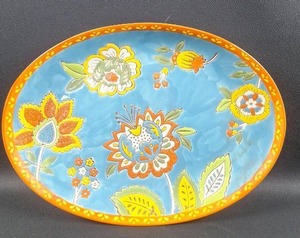 lot 7 image: Dutch Wax Coastline Imports Orange Field Pattern Ceramic Serving Plate Floral Approximately 13 inches long Microwave and Dishwasher Safe