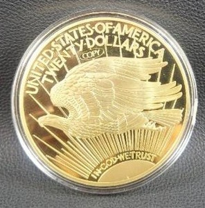lot 15 image: This item is a 1933 Saint-Gaudens $20 Double Eagle replica token, commonly produced as a gold-plated tribute piece