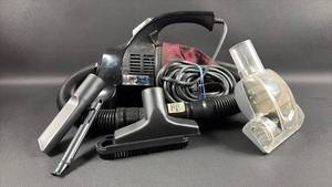 lot 43 image: Dirt Devil by Royal Hand Vacuum with Accessories. Nice Long Cord.