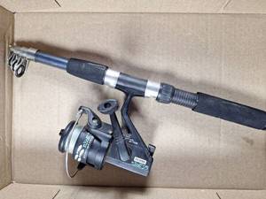 lot 59 image: Silstar Neon 35 Spinning Reel with Telescopic Fishing Rod