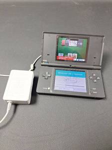 Clean Nintendo DSi Handheld Console with Charger Super Mario Bros Game and Stylus