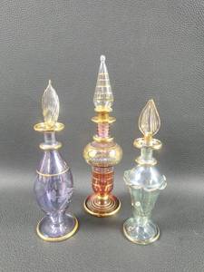 lot 76 image: (3) Delicate Egyptian Perfume Bottles