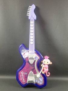 lot 82 image: Dream Dazzlers Electric Guitar with Fingerling Monkey Interactive Toy
