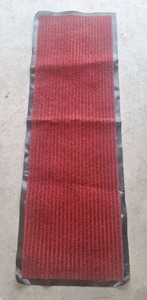 lot 153 image: Red Outdoor Tread  Mat with Rubber Edging - 47 Long