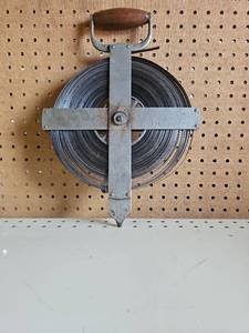lot 5014 image: Vintage Lufkin Surveyors Tape Reel