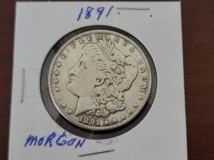 lot 10040 image: 1891-S Morgan Silver Dollar