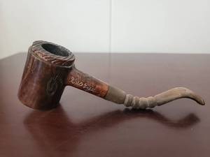 lot 10065 image: Tobacco Pipe with Carved Bowl and Stem