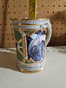 lot 5052 image: The Dragon Chronicles Decorative Mug with Handle and Gold Trim