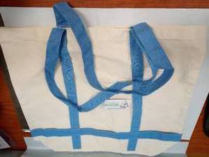 lot 2129 image: Canvas Tote Bag with Blue Handles and Straps - Retail $10