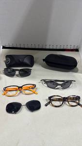 lot 1004 image: Oakley Mars X-Metal sunglasses, Ray Bans sunglasses and other glasses