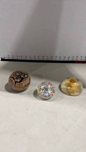 lot 1006 image: Art glass paper weights one is signed one is also resin