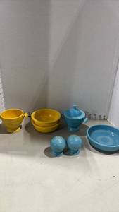 lot 1014 image: Vintage Fiesta Ware Mixed Yellow and Turquoise Ceramic Tableware Collection