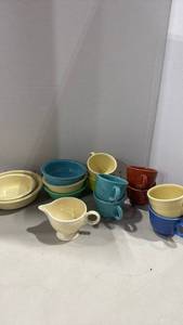 lot 1021 image: Vintage Fiesta HLC Mixed Color Ceramic bowls, mugs and creamer dish