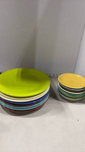 lot 1024 image: Stamped Fiesta Ware Mixed Color Dinner Plates and Saucers Set