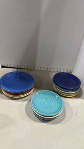 lot 1025 image: Stamped Fiesta HLC USA Mixed Color Plates and Saucers Set