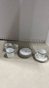 lot 1036 image: Pottery Barn Christmas Tree Espresso Cup and Saucer Set