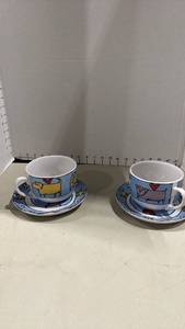 lot 1043 image: Whimsical Dog Themed Ceramic Cup and Saucer Set of 2