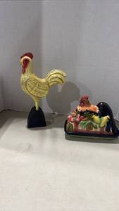 lot 1066 image: Rooster Figurine Set - Carved Standing Rooster and Ceramic Rooster with Harvest Vegetables butter dish