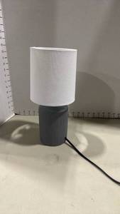 lot 1076 image: Small Accent Table Lamp with Textured Gray Base and White Fabric Shade 13 inches tall