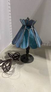 lot 1089 image: Tiffany-Style Blue Stained Glass Mini Table Lamp some of the shade needs repaired see pictures 9 inches tall