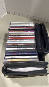 lot 1103 image: Mixed Music CD Collection with Zipper Cases