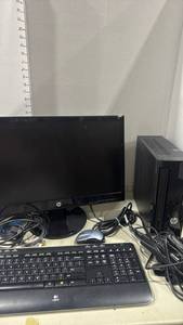 lot 1106 image: HP Slimline 260-a010 Desktop PC Bundle with HP Monitor, Logitech Keyboard and Mouse