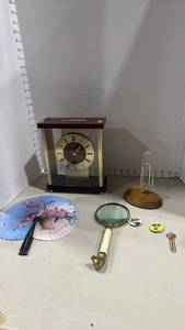 lot 1114 image: Seiko Quartz Mantel Clock, brass and bone style handled magnifying glass with dog face end and more