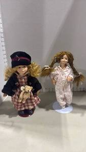 lot 1121 image: Boyds bear porcelain doll with wyzzue teddy and porcelain doll in pajamas