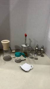 lot 1203 image: PAMCO nut chopper features a clear glass measuring cup base, weighted pewter salt and pepper shakers and more