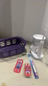 lot 1257 image: Waterpik Sonic Fusion 2.0 Electric Toothbrush & Water Flosser Bundle with Colgate Wisp Toothbrushes and Storage Basket