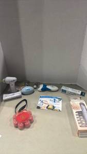 lot 1259 image: Personal Care & Grooming Tool Bundle - Ped Egg, WaxVac, Nail Kit & More