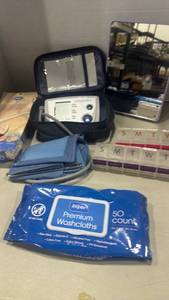 lot 1260 image: LifeSource Plus Blood Pressure Monitor, lighted mirror, pill organizer and qtips